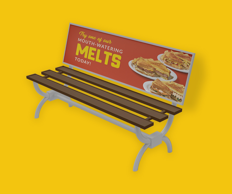 An ad for Denny's on a bench, showing off their Melts menu item